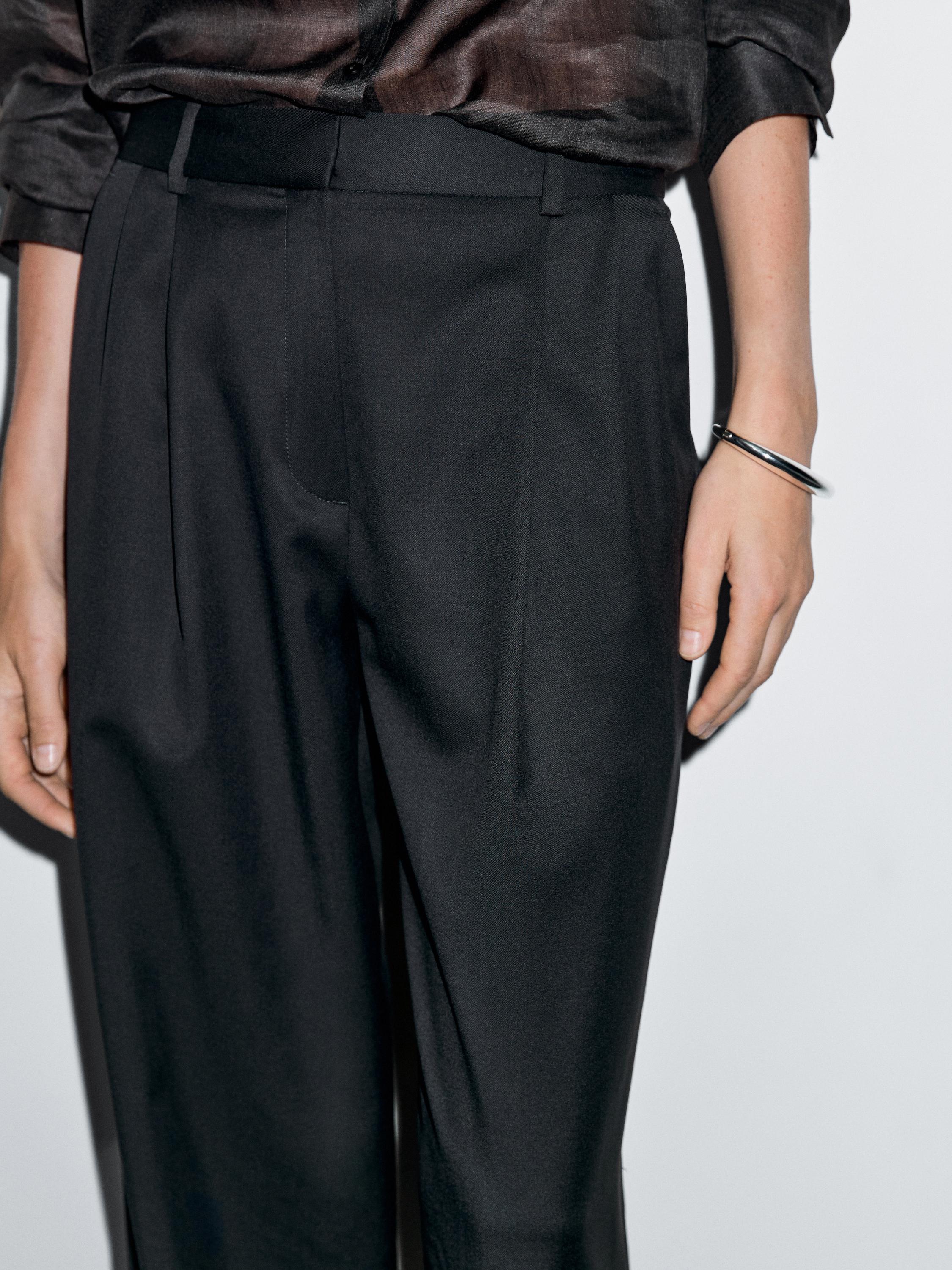 Pleated extra fine wool trousers
